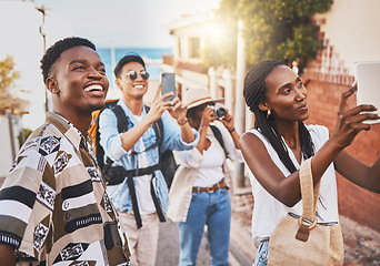 Image showing Travel people doing cellphone photography of architecture abroad in a foreign city street. Men and women influencer or tourists making memories on phone of summer vacation for online social media app