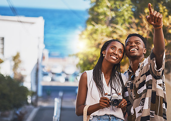 Image showing Photographer couple on summer vacation or holiday abroad and tourism with lens flare, ocean and street background. Black people, man and woman looking at tourist destination for travel photography