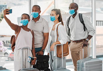 Image showing Travel people taking selfie with covid face mask at the airport on their trip, travel or holiday overseas. Group of people or friends with suitcase, phone and social media memories while on vacation