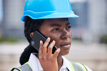 Image showing Architect engineer on a phone call conversation at a construction site building working in a safety helmet. Architecture and industrial designer in a serious discussion about engineering project