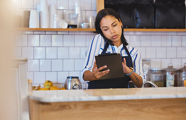 Image showing Cafe manager, planning online and working on digital tablet app with internet, phone call and sales in restaurant startup. Small business store, woman entrepreneur and coffee shop hospitality worker