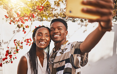 Image showing Man and woman love taking a selfie portrait together as a couple smiling during summer under relaxing sun. Happy, smile and free boyfriend and young girlfriend take pictures on phone for social media