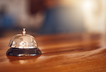 Image showing Service bell at information desk at a hotel, motel or restaurant for hospitality industry background. Customer service or help at receptionist in a luxury suite for tourism business