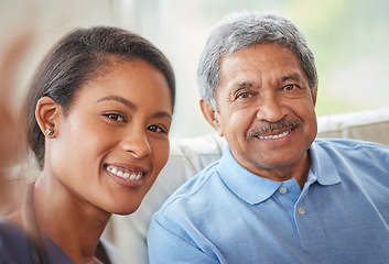 Image showing Portrait senior man and woman nurse with a selfie in the living room of a retirement home. Healthcare worker and elderly male smile while bonding on a couch together at a house for retired people