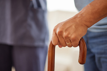 Image showing Support, physiotherapy and disability patient hold walking stick or cane, practice recovery with physical therapist or nurse. Senior man suffering from Parkinson, assisted living retirement facility