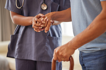 Image showing Retirement, healthcare and support with a nurse and senior patient in an old age home with a walking stick. Elderly man and medical professional walking and holding hands in trust, care and help