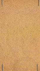 Image showing Brown pressed cardboard background - vertical