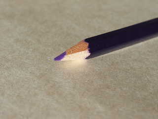 Image showing Violet pencil over paper