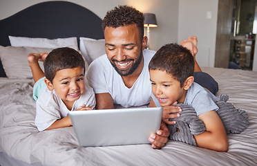 Image showing Happy, father and kids watching entertainment shows on digital tablet in the bedroom at home. Technology, man and children relax on bed together to bond and have fun streaming with fast 5g internet.