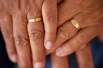 Image showing Support, trust and love of a senior married couple hands with rings and are in love for many years. Closeup of mature lovers touching and showing feelings of compassion and care