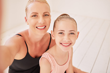 Image showing Family, dance and ballet with a mother and her young daughter taking a selfie in a dancing studio for the performing arts. Portrait of a child ballerina and her parent training for a recital or show