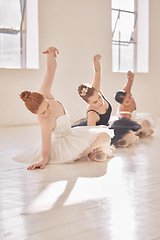 Image showing Women ballet dance, art students dancing or learning and training for competition in studio while stretching. Young diversity group, team of dancer or artist doing a performance on floor
