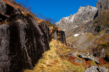 Image showing Majestic Mountain Landscape With Rugged Cliffs and Autumn Vegeta