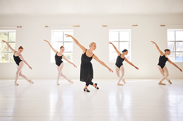 Image showing Ballet, dance students and teacher in class for practice, training and performance in studio. Classic art dancers moving with balance, grace and passion during a lesson at a ballerina dancing school