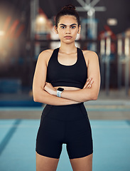 Image showing Portrait of fitness, exercise and workout woman in sport training for health and fit body in a gym. Serious, healthy or strong athlete with motivation or wellness before cardio routine in sports club