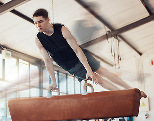 Image showing Man doing fitness training exercise at gym, sports motivation for health and workout for strong body at sport club. Athlete doing cardio gymnastics with power, exercise for wellness and competition