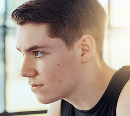 Image showing Thinking man face with motivation and focus in a room alone while focused on goal and determined. Headshot of young person with effort, pride and idea or mental vision to be a success in life