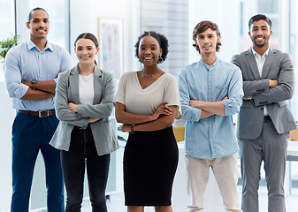 Image showing Collaboration, teamwork and leadership with proud business, partner standing in unity and power in an office. Portrait of smiling diverse team leader on a mission for success with goal and vision