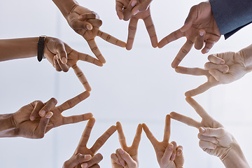Image showing Peace, teamwork and support or collaboration of business people hands or finger as symbol of their partnership and trust. Diversity, friends and corporate company workers making star working together