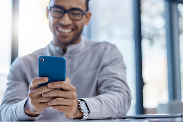 Image showing Phone with good news for a happy and excited male entrepreneur reading online social media posts in the office. Business man texting and browsing the internet or using mobile app, web or website