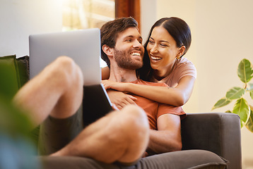 Image showing Happy and relax couple with a laptop on the sofa, live streaming movies or social media content with internet or home wifi in a living room. Love and smile of young man and woman on a couch together