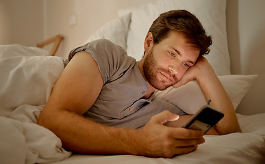 Image showing Insomnia, bored and social media in bed to destress and calm. Sleeping problems, anxiety and depression or smartphone addiction. Mental health issues or cheating online with mobile app.