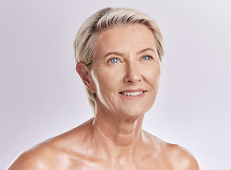 Image showing Skincare, beauty and wellness in retirement, a senior woman isolated against a pink background in a studio. Happy elderly female with a good skin care and healthy routine is self care for your face.
