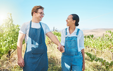 Image showing Interracial couple farming on wine farm in nature, farmer on vineyard in natural environment for agriculture and green sustainable lifestyle in countryside. Sustainability and ecology in summer