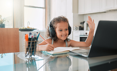 Image showing Homeschool, education and video call distance learning for child on laptop in home living room. Smile, writing and happy girl or waving student greeting on online school and study class for homework