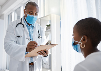 Image showing Covid doctor or medical worker consulting a patient for and writing health information at the hospital. Healthcare man working on insurance, paper or checklist for a woman at a clinic