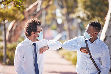 Image showing Covid greet, social distancing and elbow bump by business men meeting and greeting outdoors. Happy, friendly and excited colleagues using covid19 prevention protocol and wearing masks