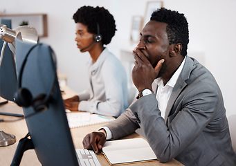 Image showing Tired, burnout and exhausted business man, overworked sleepy and yawning in his call center office at work. Exhaustion and tiredness with a customer support agent or sales agent sitting at his desk