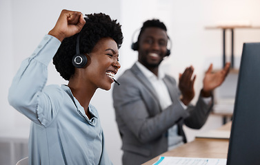 Image showing Celebrating, cheering and success with a female call center agent or support staff employee working in service or sales. Helping, assisting and talking to solve problems and provide feedback