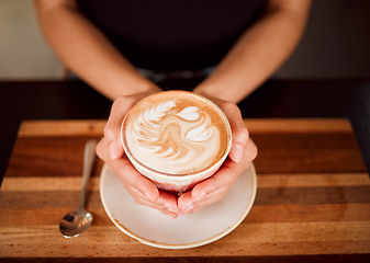 Image showing Coffee, tea and cappuccino drink in hands of a waiter working in coffee shop, cafe and restaurant. Closeup of server, employee and woman with warm or hot beverage in barista industry and hospitality