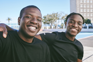 Image showing Brothers, siblings and friends spending time together, bonding as a family and enjoying the city. Portrait of young man travelling, exploring and walking in an urban town while on vacation or holiday