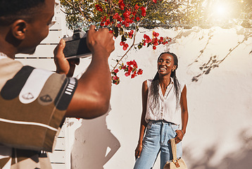 Image showing Photographer, portrait and happy model woman in summer clothes for a creative fashion shoot outdoors. Influencer, freelancer and entrepreneur in professional photography taking social media content