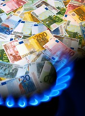 Image showing EURO notes and gas stove