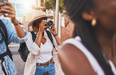 Image showing Travel, tourism and photograph with a woman tourist taking a picture while on holiday, vacation or weekend getaway. Memories, sightseeing and overseas with a young female using a camera abroad