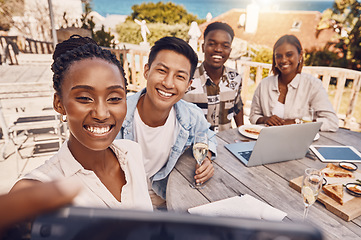 Image showing Group of business people taking a selfie at a restaurant having a lunch meeting outdoors in a city. Colleagues or friends take a picture or a photo while on a break from work having brunch at a cafe