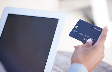 Image showing Business person banking on tablet with credit card, shopping for online purchase on finance mobile app and buying product on the web with technology. Hand of person doing digital financial payment