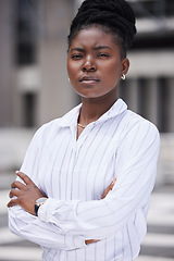 Image showing Motivation, vision and mission with a mindset of vision and a mission of growth and development for her company in the city. Portrait of a business woman standing arms crossed on an urban background