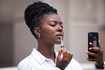 Image showing Business woman with beauty cosmetics with camera phone, person with lipstick or face makeup with cellphone mirror in the urban city. Employee and worker ready for work in the morning with 5g mobile