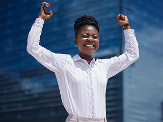 Image showing Excited, happy and celebration woman employee with phone for deal, promotion and online sale in a city. Smiling, successful and cheerful freelance entrepreneur cheering after winning the lottery