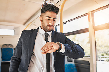 Image showing Business man on bus, travel time and morning transport to work, office or meeting. Young entrepreneur, corporate worker and suit employee check watch clock for good time management on morning commute