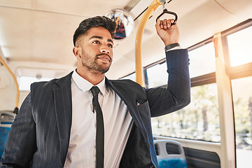 Image showing Business man, commuting and bus travel with public transport. Travelling person in formal suit alone in urban transportation. Professional and dedicated worker standing in moving vehicle.