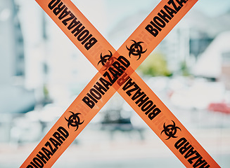 Image showing Biohazard caution, danger barrier tape of a quarantine zone. Bright orange safety stripes across infected area, no entry or cross, room closed down for cleaning and inspection over copy space.