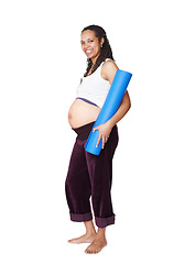 Image showing Pregnant, happy and yoga woman in portrait shows pregnancy, healthcare and wellness for her baby. Pilates, fitness and spiritual mother to be with a smile, mat and big stomach in studio for exercise