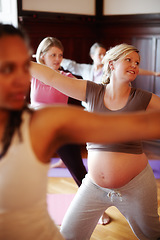 Image showing Pregnant, yoga and woman doing pilates or health fitness exercise in a class workout studio. Pregnant woman or mother abdomen, doing cardio for pregnancy wellness or healthy motivation in yoga class