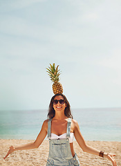 Image showing Exotic Pineapple fruit balancing on head of beautiful girl symbol of summer beach vacation healthy organic diet food