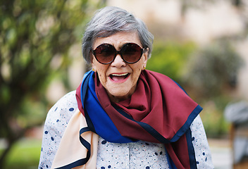 Image showing Portrait of happy old woman laughing wearing sunglasses